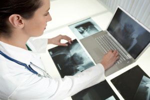 viewing an x-ray result using laptop